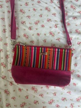 Peruvian Vibrant Pink Crossbody Bag with Multicolor Stripe Panel